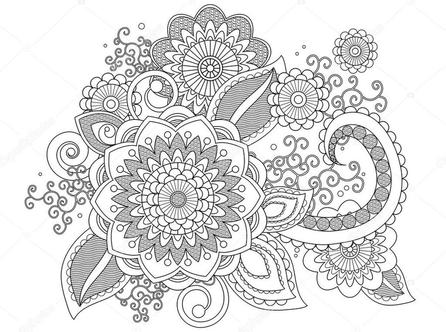 Printed floral adult coloring pages fanned out on a desk